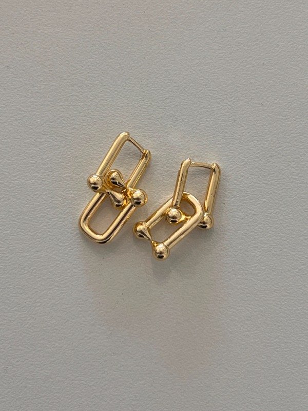 Producto - Aros Anto acero dorado.