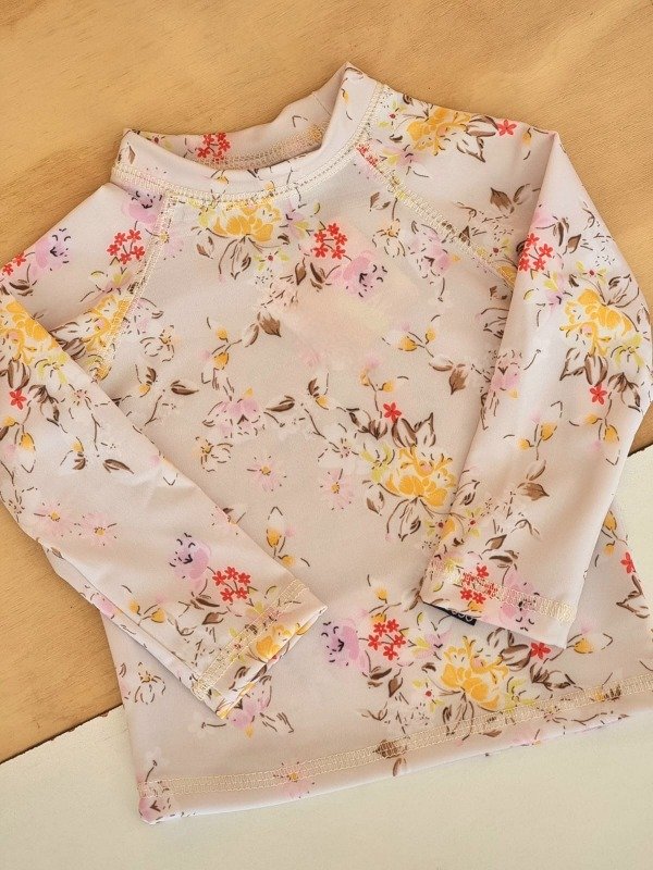 Producto - Remera CAMPO DE FLORES natural mangas largas