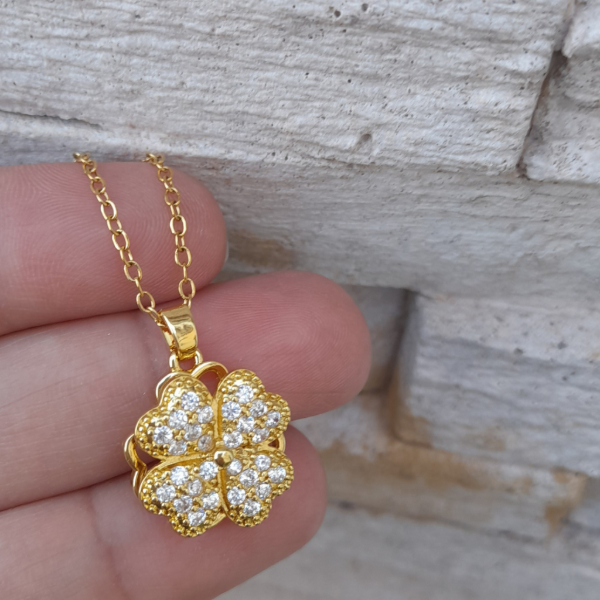 Producto - Collar giratorio trebol