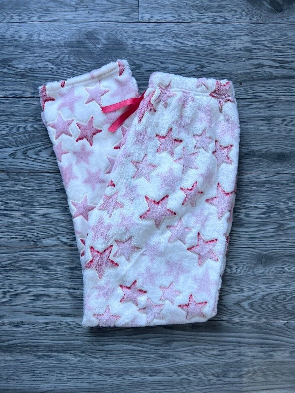 Producto - Pantalón plush luminoso blanco estrellas rosas