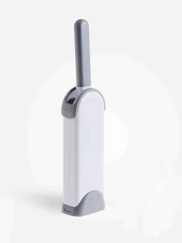 Producto - Cepillo para limpieza de pelos de la ropa.