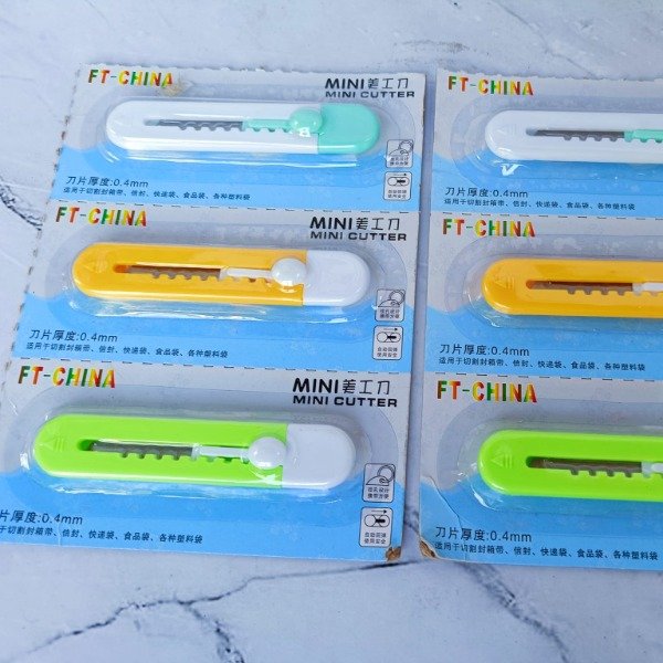 Producto - CUTTER INFANTIL PASTEL BLISTER X12