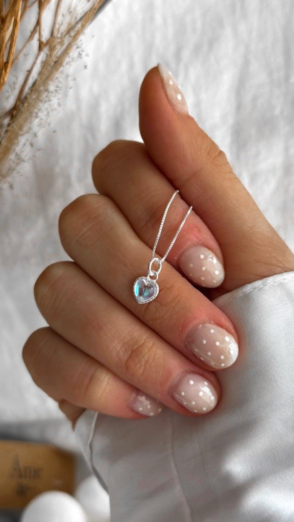 Producto - Dije mini corazón tornasol