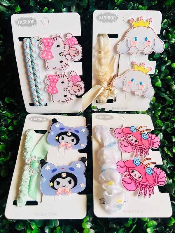Producto - Set de hebillas pinza y colita de sanrio