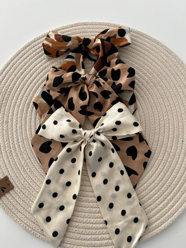 Producto - COLITA DE PELO CON MOÑO BLANCO Y PUNTOS NEGROS