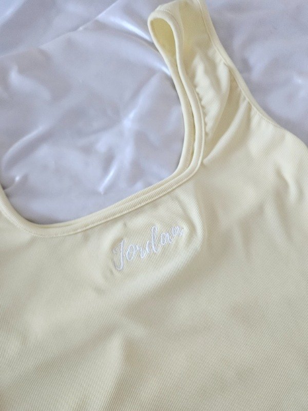 Producto - MUSCULOSA JORDAN AMARILLA MORLEY