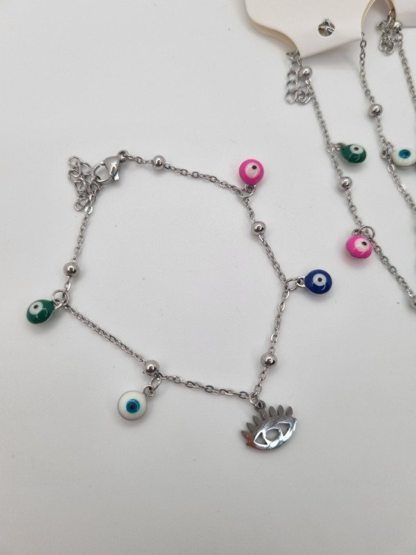 Producto - Pulseras acero quirurgico dijes ojo turco y forma plat