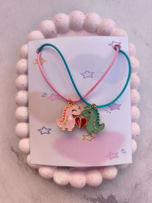 Producto - Collares Iman dinosaurios