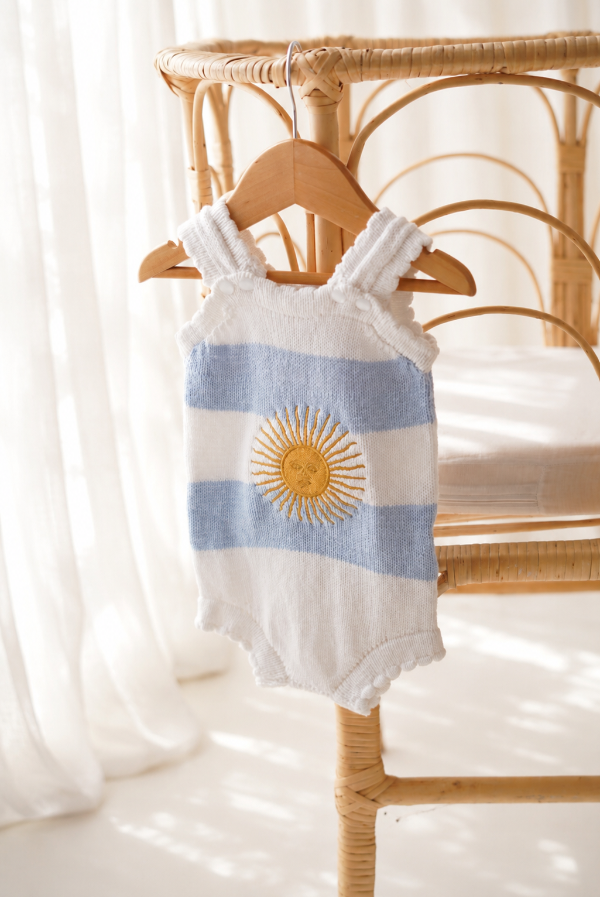 Producto - Body sol de mayo