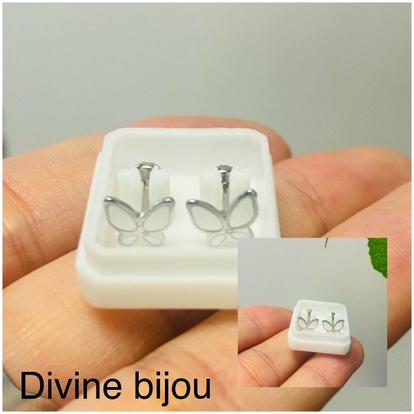 Producto - Abridores mariposas blancas acero