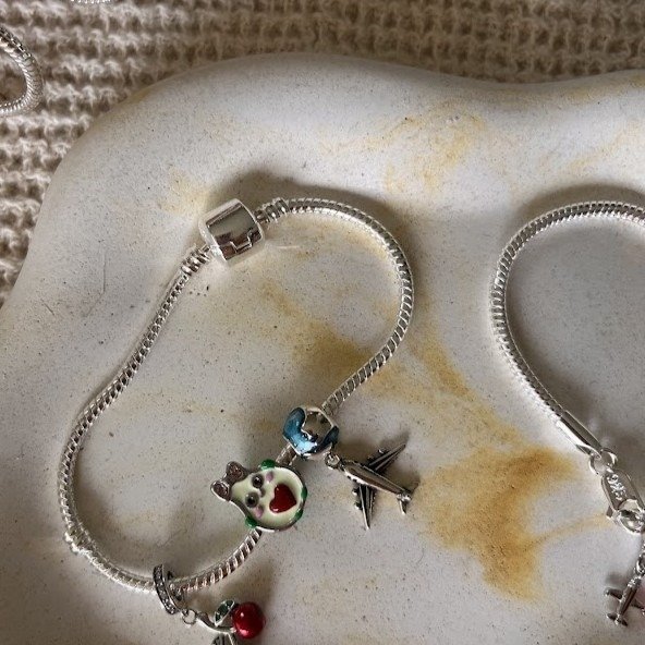 Producto - Charm Avión y mundo