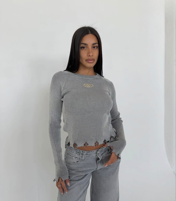 Producto - SWEATER ROTURAS