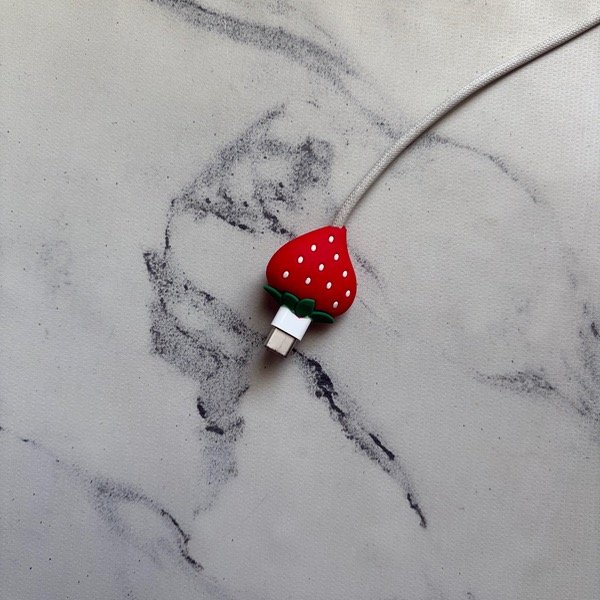 Producto - Come cable frutilla