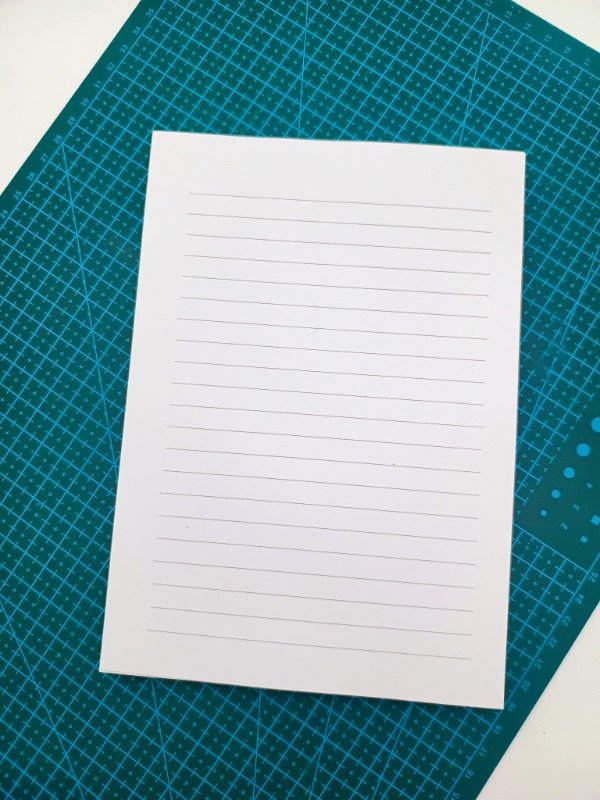 Producto - RESMA IMPRESA DE 106 GR - TAMAÑO A5 - 250 HOJAS / Con y sin perforación