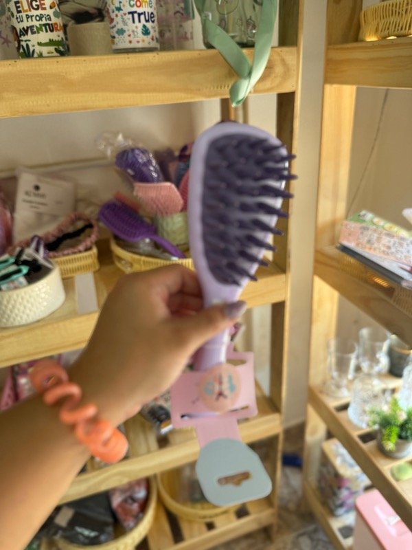 Producto - cepillo masajeador y de limpieza para cuero cabelludo