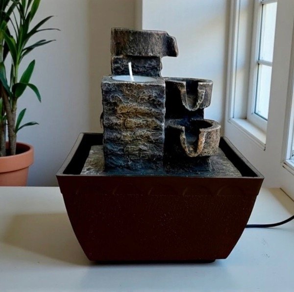 Producto - Fuente de agua con portavelas de piedra