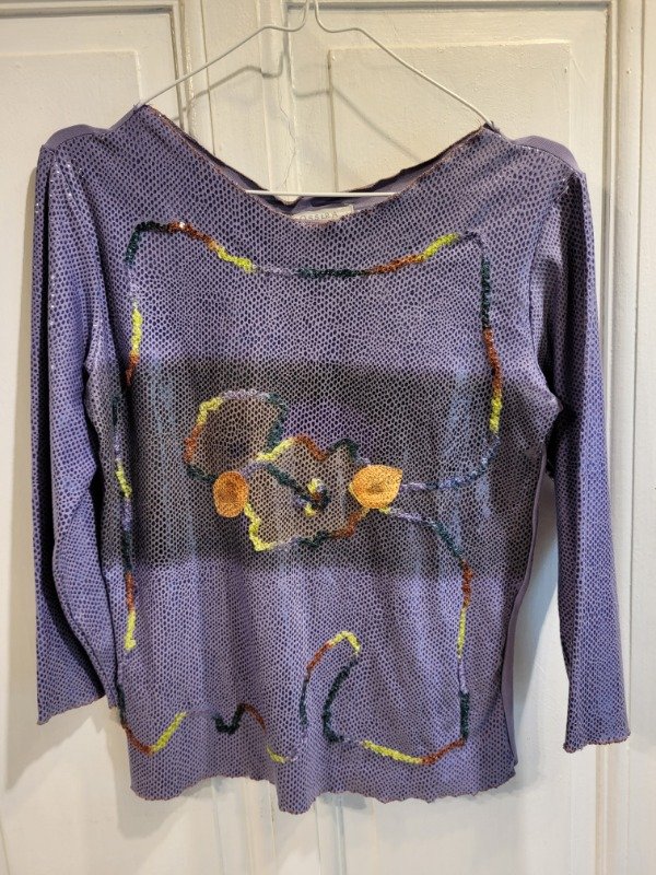Producto - Remera OSSIRA lila con brillo Talle S/M - PRECIO: 16X