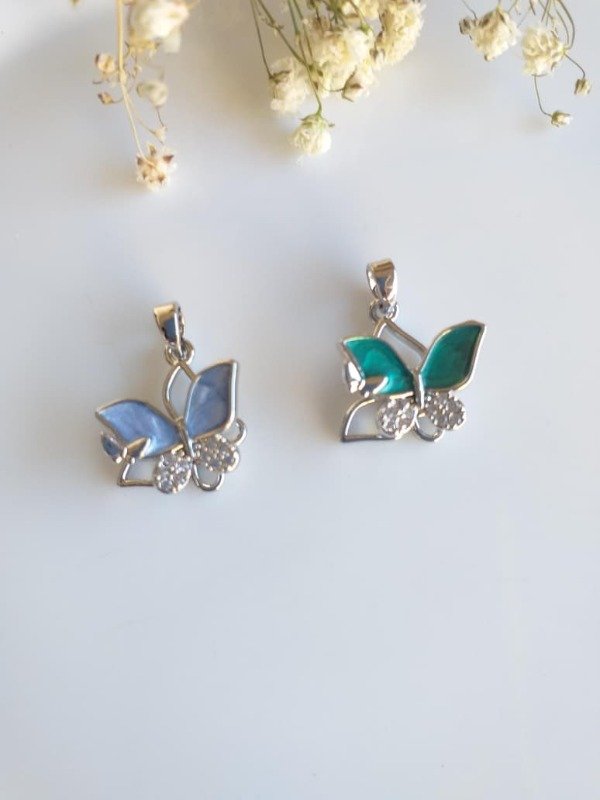 Producto - Dije Giratorio Mariposa Color