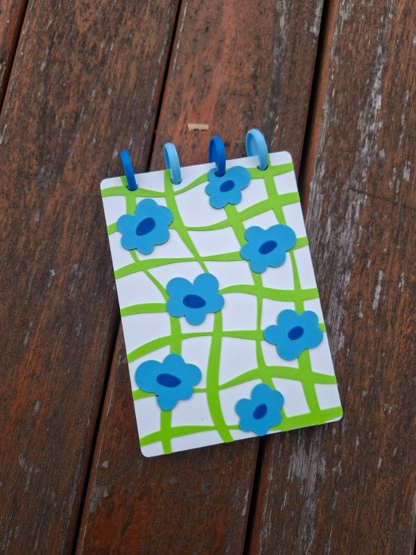 Producto - Anotador A6 - Cuadrillé verde y flores celestes