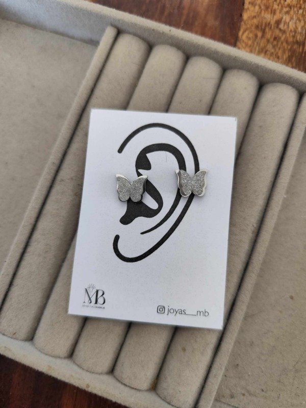 Producto - Aros pasante mariposa tipo 3D . Acero quirurgico