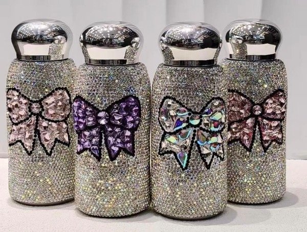 Producto - Botellita brillo moños (varios colores)(WA-