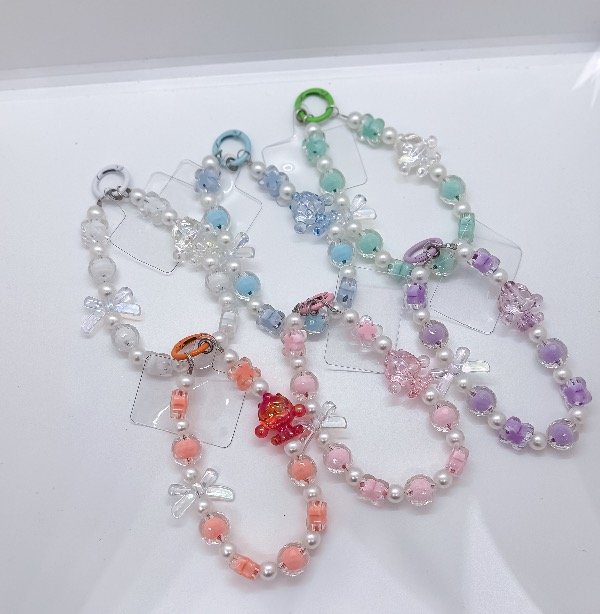 Producto - Llaveros Cry Baby pulsera para celular surtido (900086)