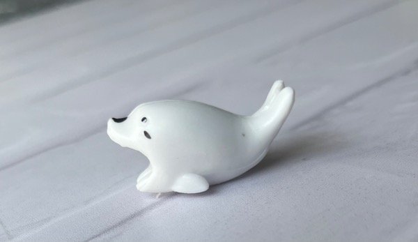 Producto - Come cable foca blanca