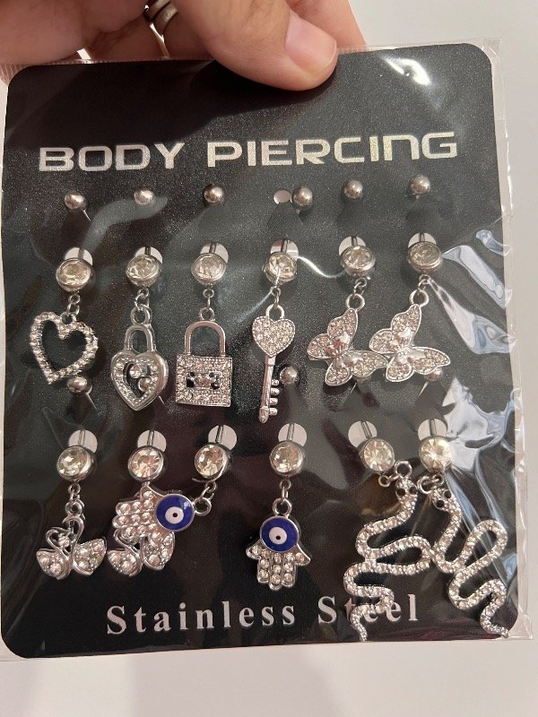 Producto - Blister de piercing ombligo dijes con vivirá