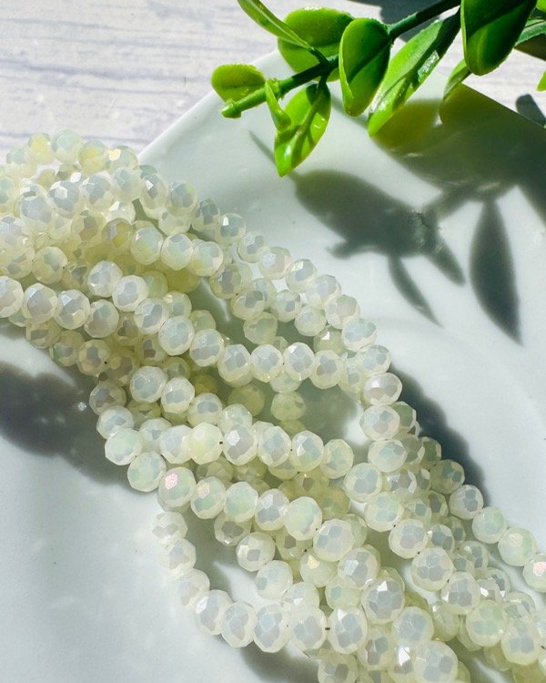 Producto - TIRA CRISTAL DE ROCA CRUDO TORNASOL 4MM
