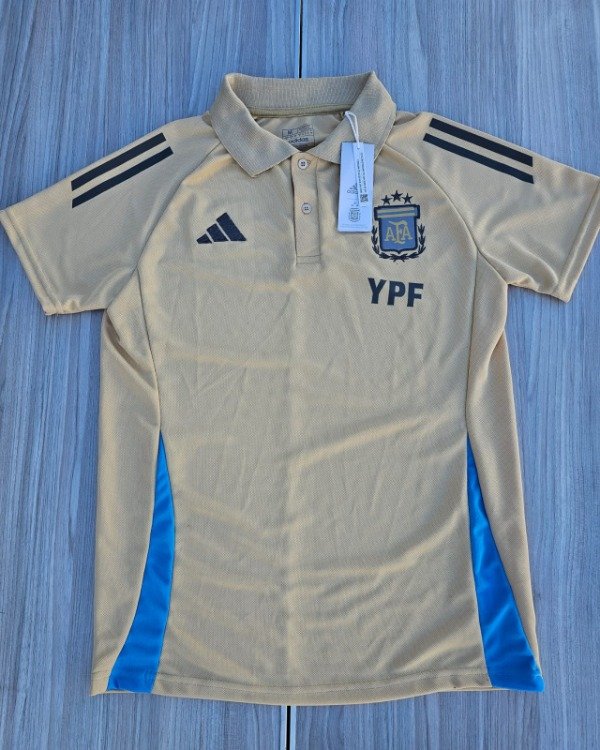 Producto - Chomba Dorada  AFA 2025