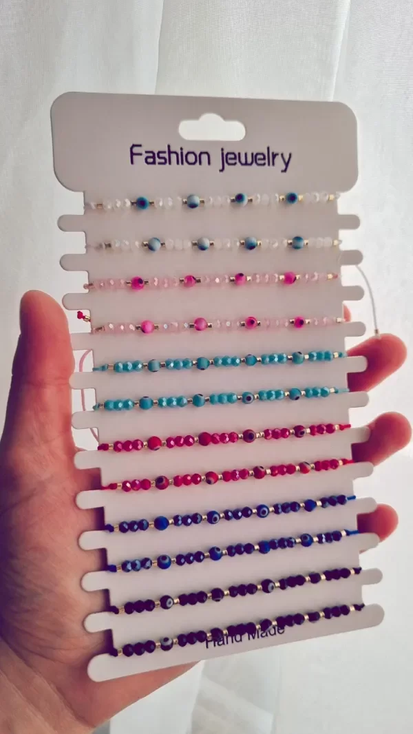 Producto - Pulsera ojitos varios colores regulable