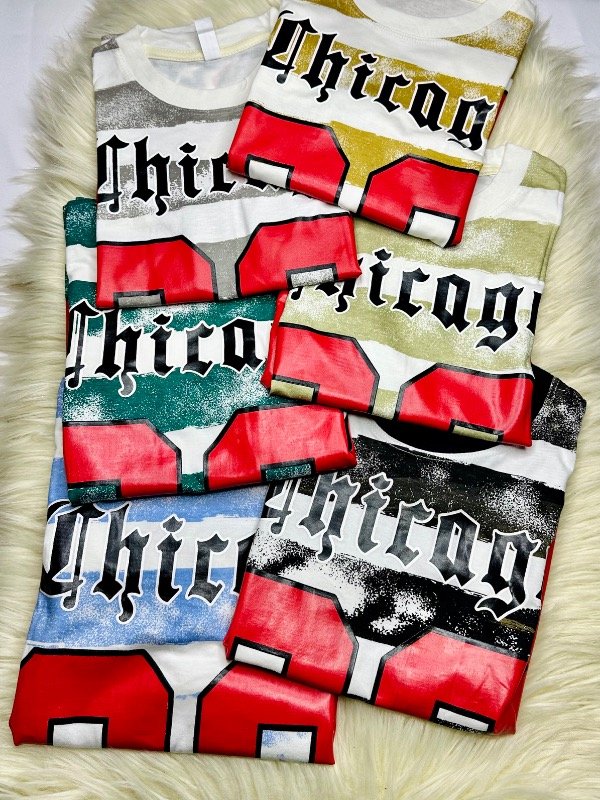 Producto - CURVA REMERA OVERSIZE CHICAGO RAYADA/POKEMON