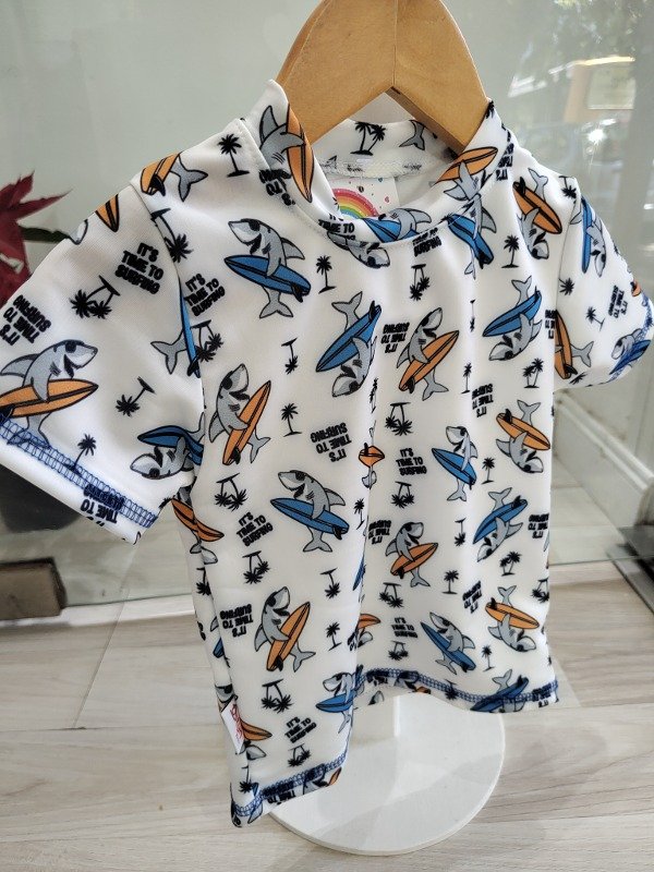 Producto - Conjunto UV dinos manga corta