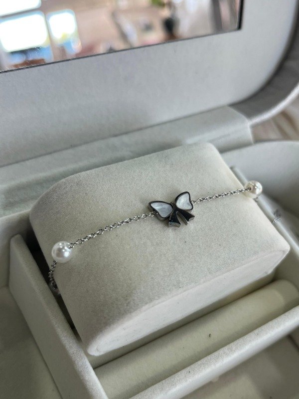 Producto - Pulsera moño plateado