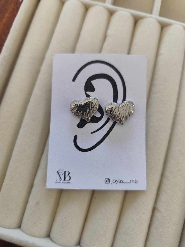 Producto - Aros chapon corazón trabajados. Acero quirúrgico.