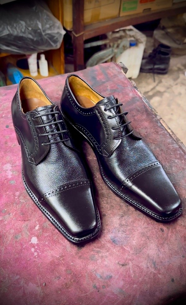 Producto - Lorenzo Cabra/Negro