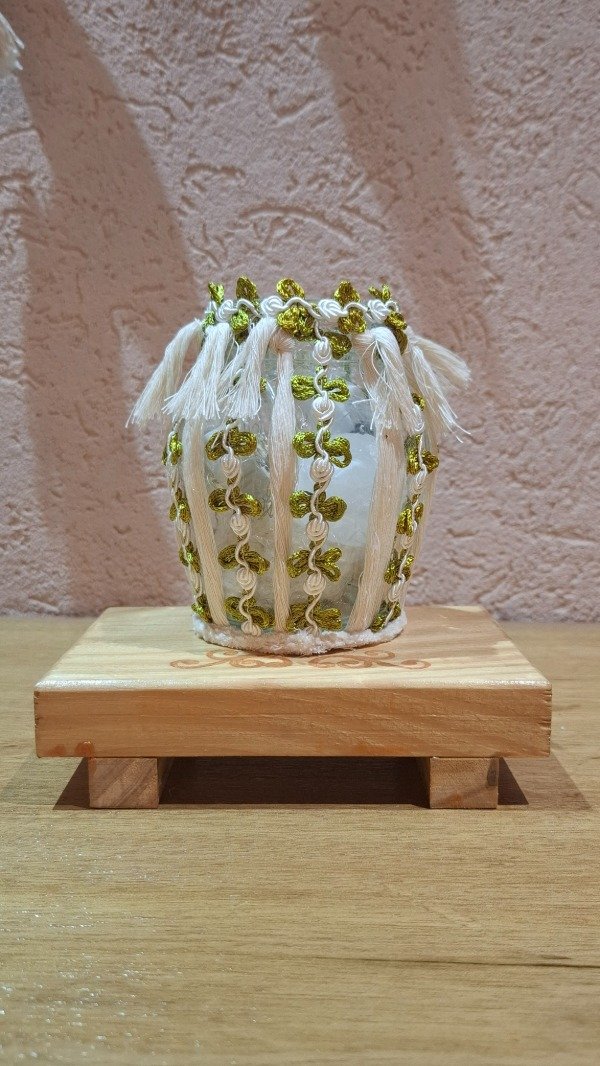 Producto - Frasco verde y blanco con sales aromáticas y vela