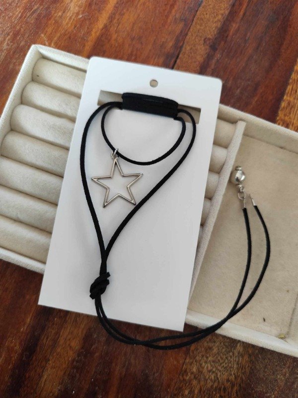 Producto - Lazo negro estrella calada. Bijou.