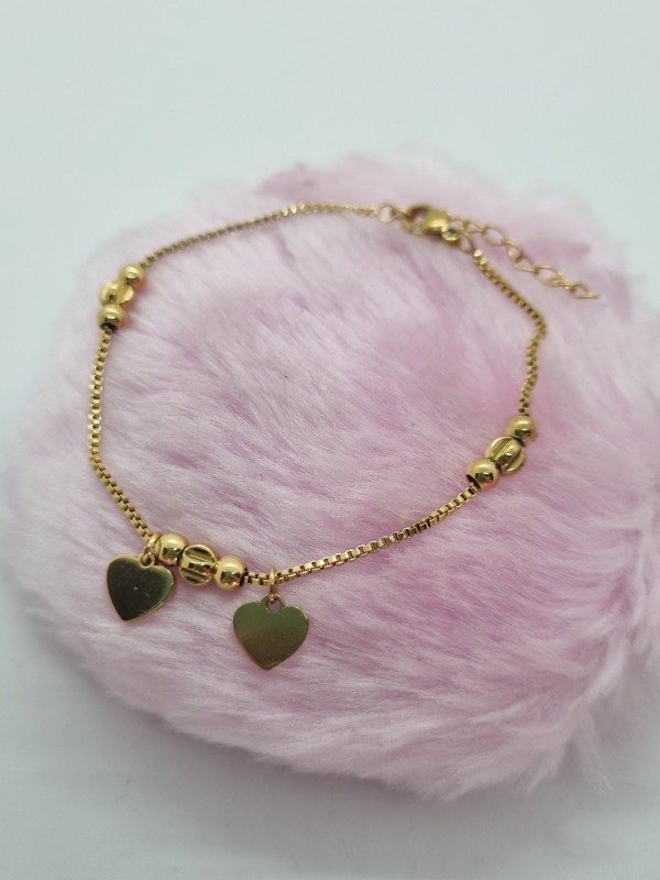 Producto - Pulsera acero dorado pelotitas y corazones CPUL456