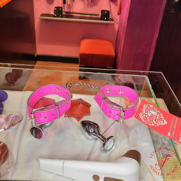 Producto - Esposas rosa fluor con cadena