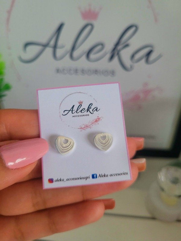 Producto - Aros corazones calados de acero blanco - 0