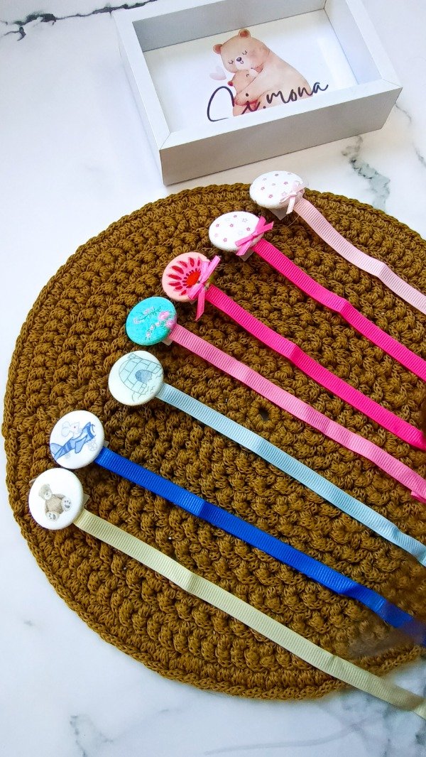 Producto - Portachupetes boton