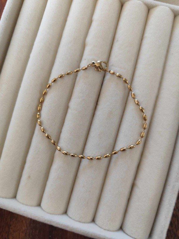 Producto - Pulsera mini semillitas. Acero dorado.