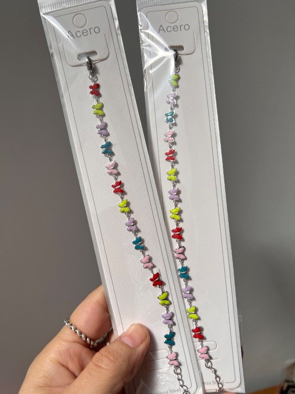 Producto - 2 pulseras de acero con mariposas