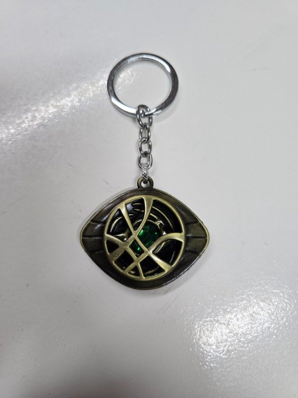 Producto - Llavero Ojo de Agamotto bronce