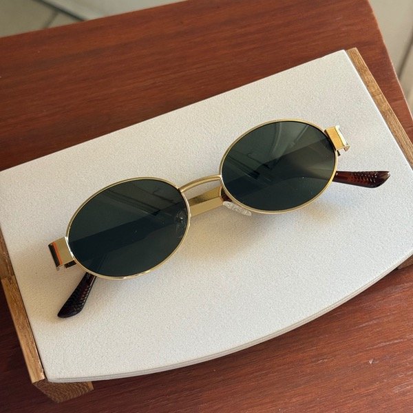 Producto - Lente dorado oscuro patitas print