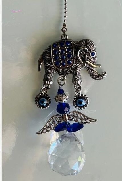 Producto - Atrapasoles alitas azules elefante con strass y cadenita