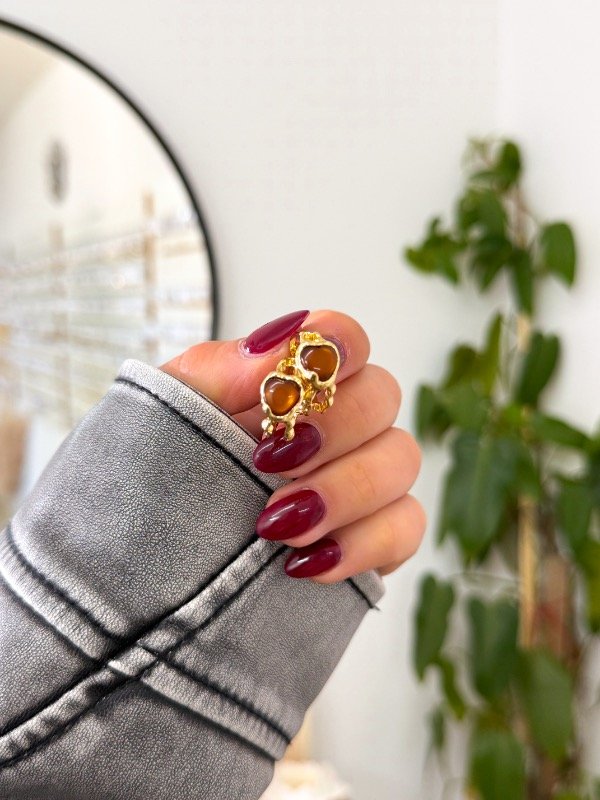 Producto - Semi argollitas acero dorado corazón marrón