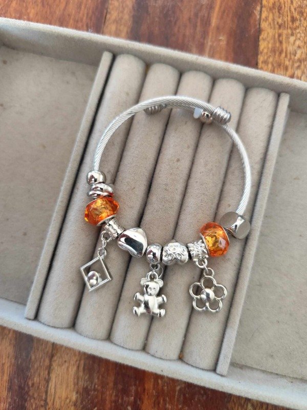 Producto - Pulsera pandora osito naranja.