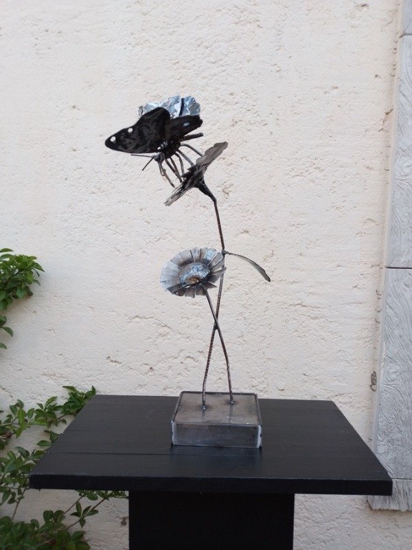 Producto - Flor y mariposa.